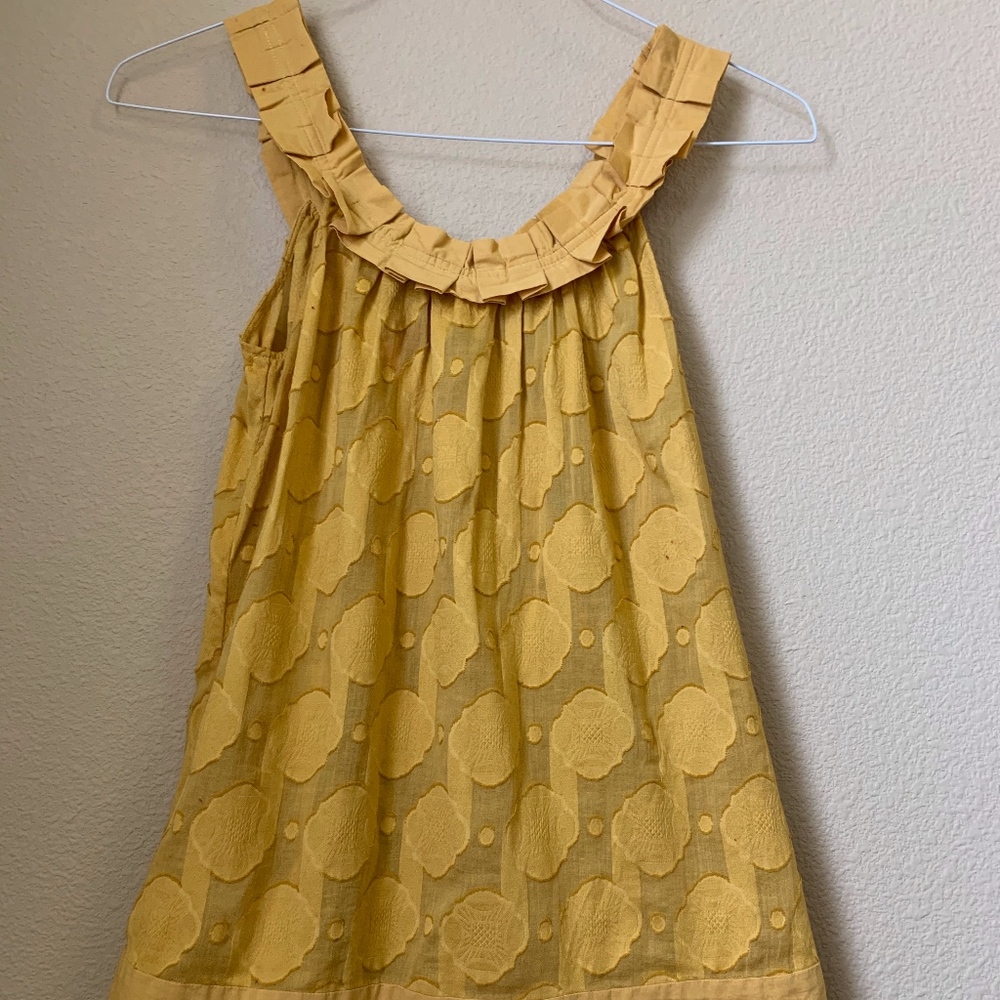 yellow flowy tank
